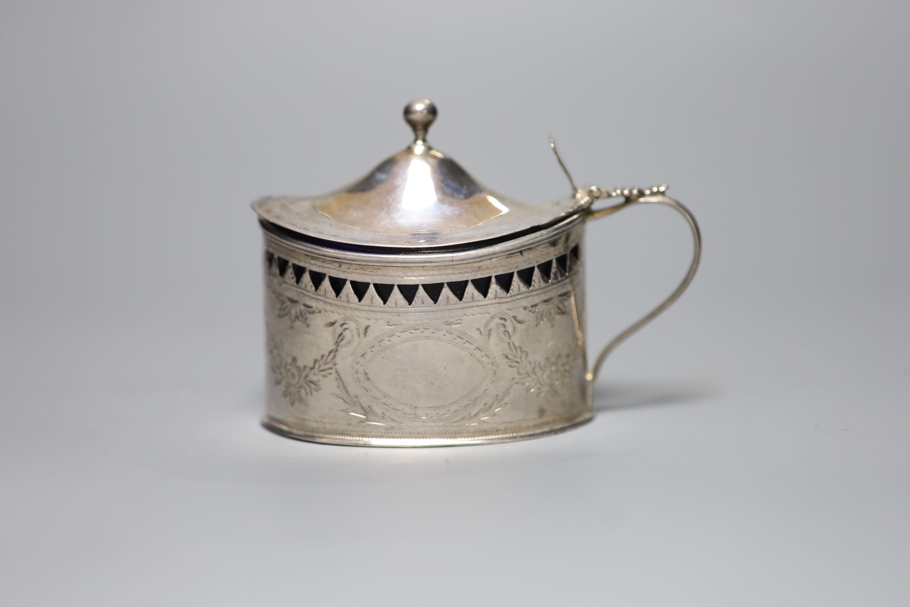 A George III pierced oval mustard, London, 1790, (a.f.).